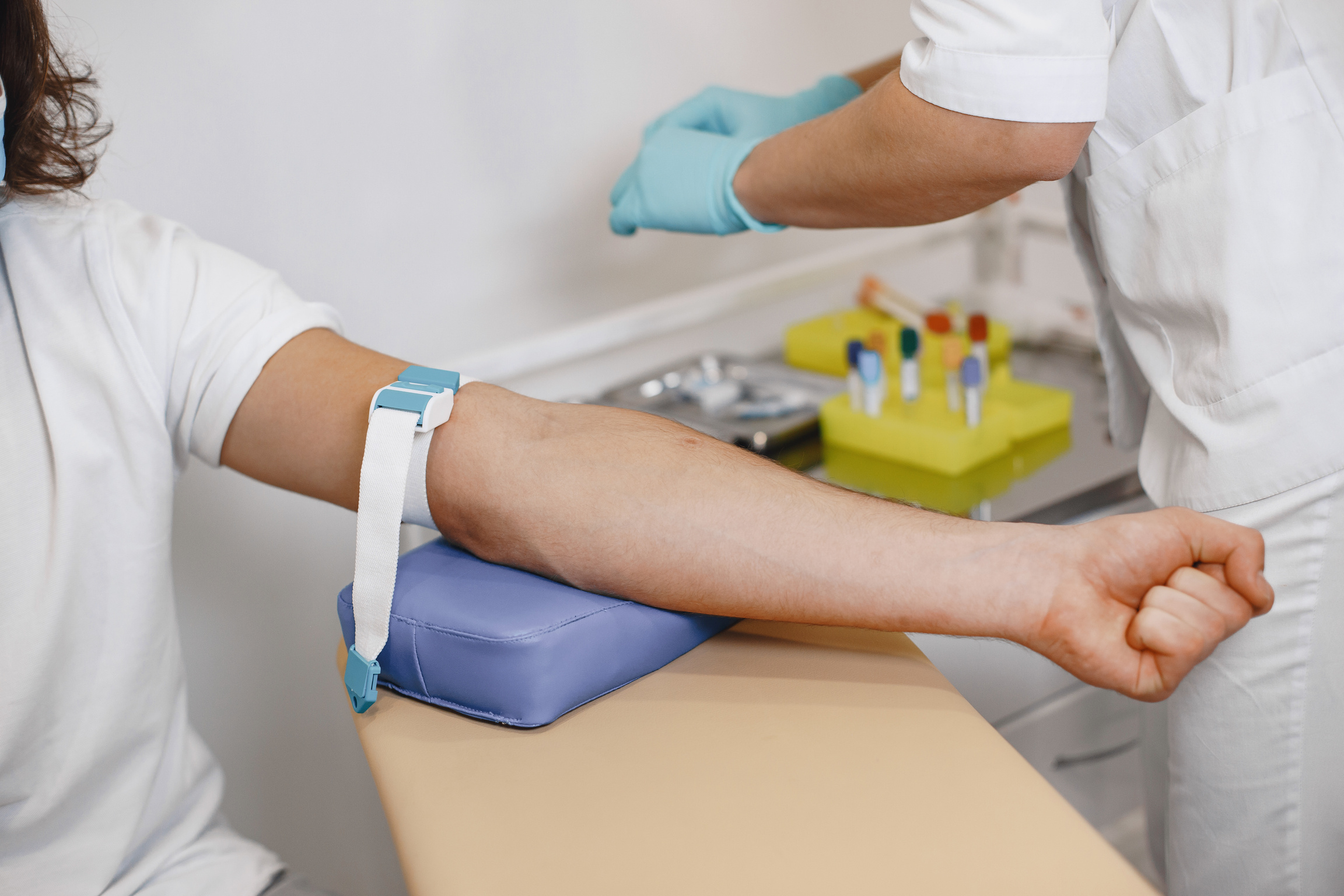 Nurse Taking Blood Sample from Patient